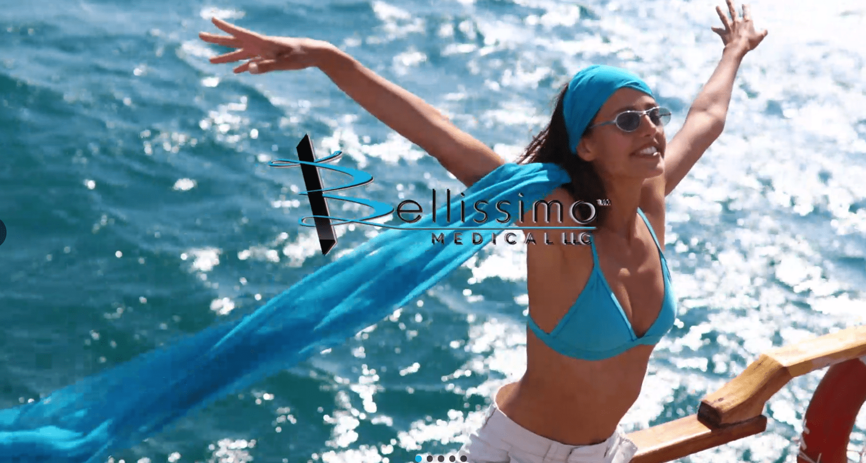 Girl in boat blue bikini